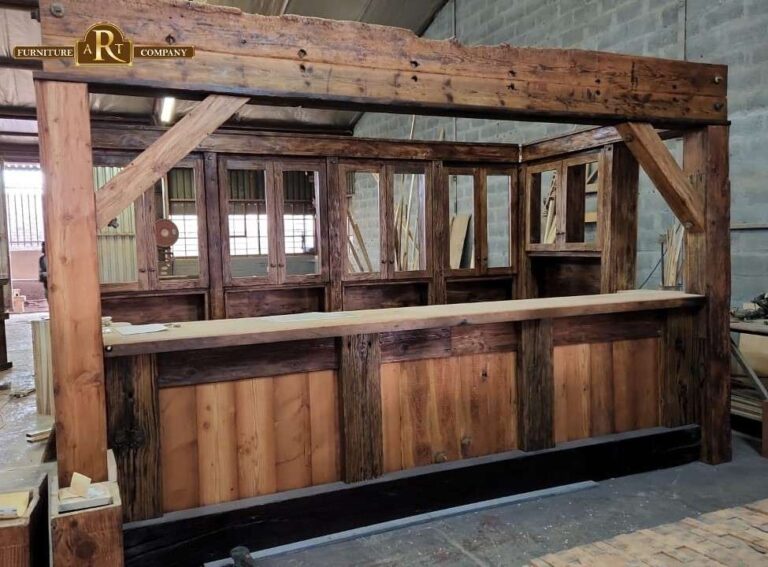 Timber bar with an exposed beam frame, diagonal braces and glazed cabinets behind the counter