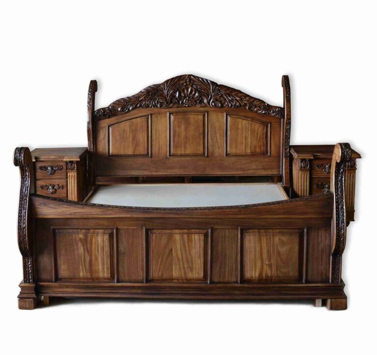Wooden bed frame with a carved headboard, panelled footboard and matching bedside units