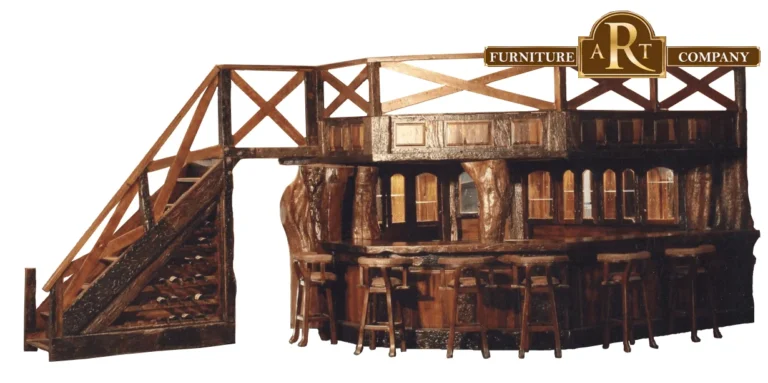 Large wooden bar with stools, an adjacent staircase and a railing above