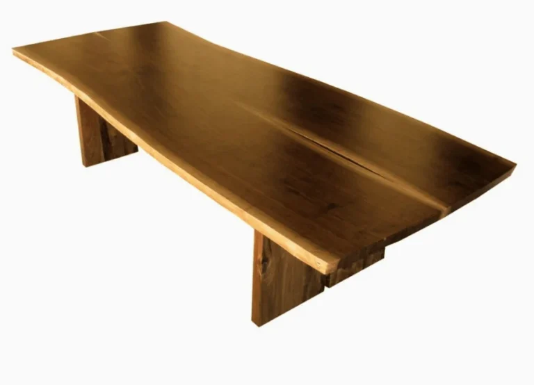 Rectangular wooden dining table with a broad top and two panel legs