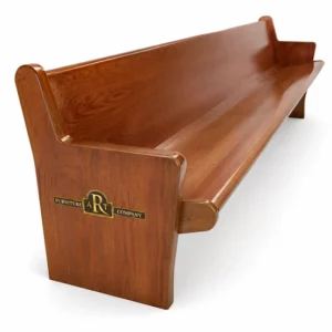 Warm brown Blackwood church pew with a sweeping back, shaped seat and wooden end panels